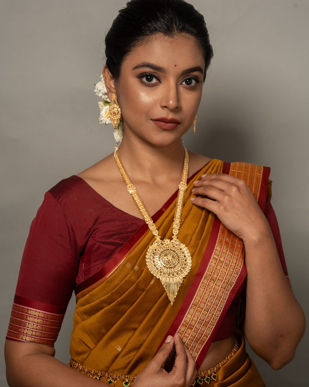 Aishwarya Chakra Royale Jewellery Set – Antique Matte Gold-Plated Necklace & Earrings Set