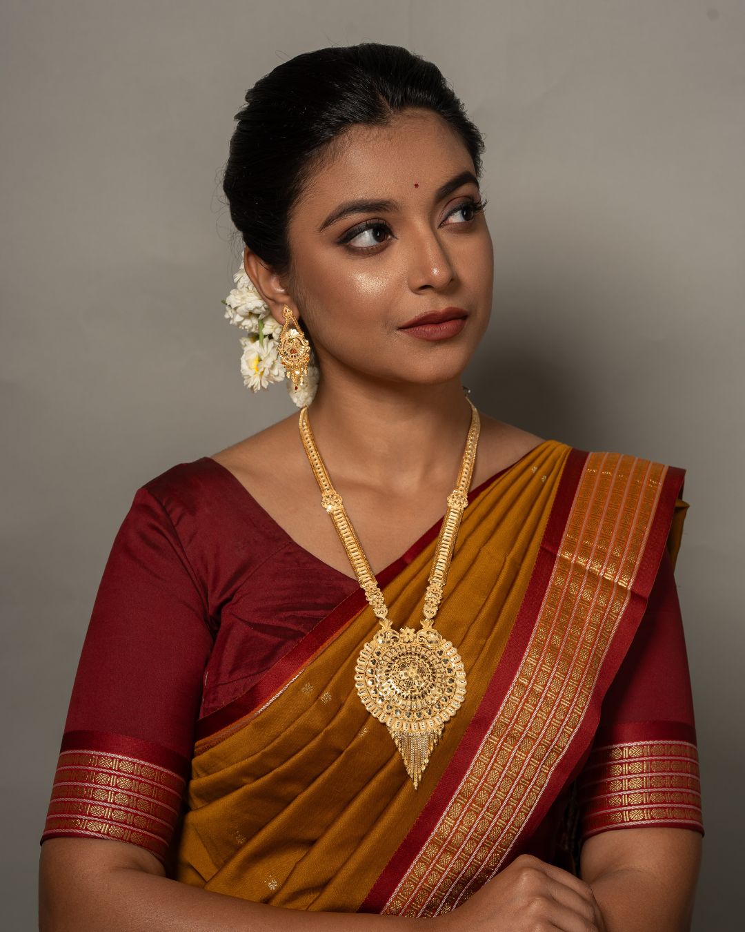 Aishwarya Chakra Royale Jewellery Set – Antique Matte Gold-Plated Necklace & Earrings Set