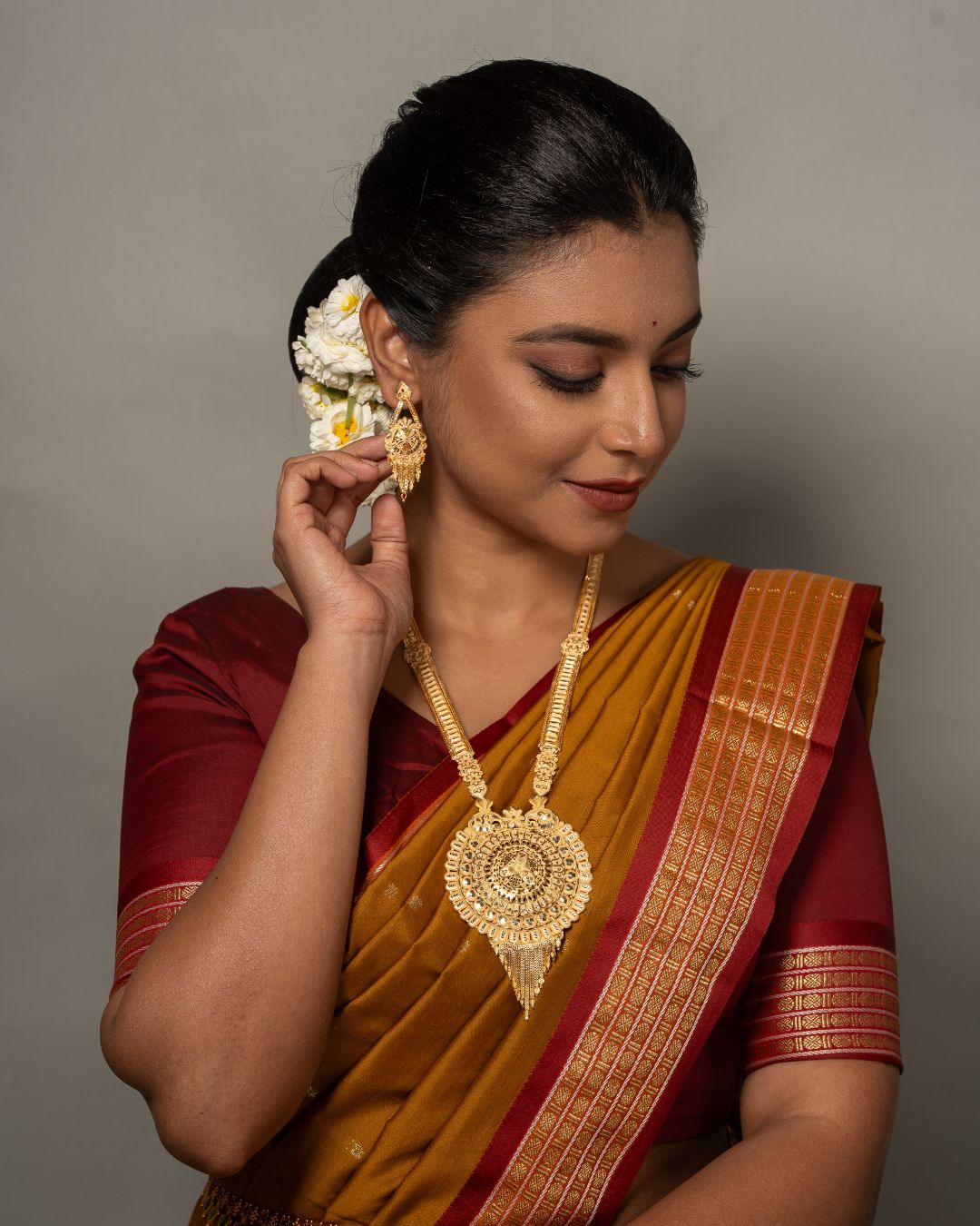 Aishwarya Chakra Royale Jewellery Set – Antique Matte Gold-Plated Necklace & Earrings Set