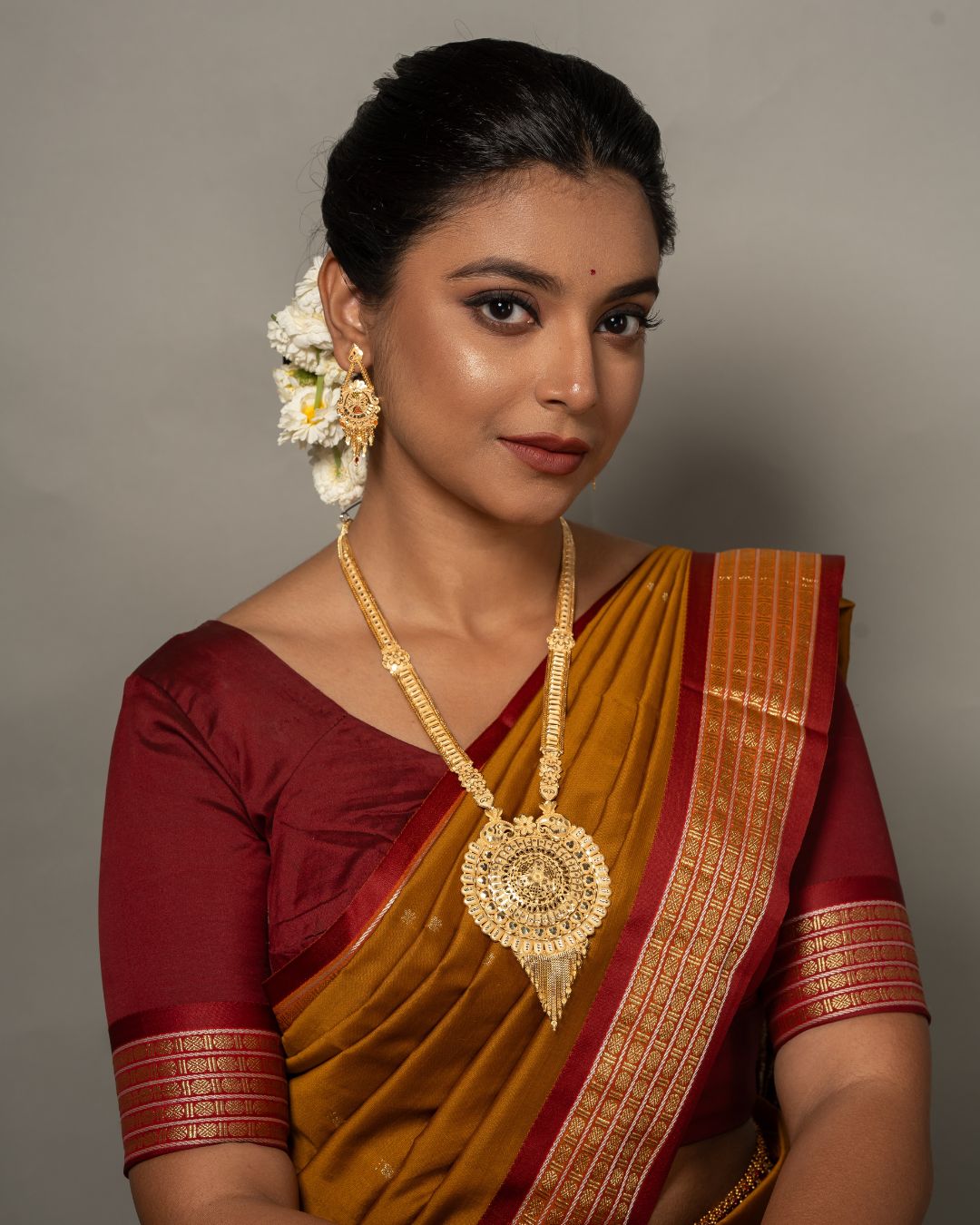 Aishwarya Chakra Royale Jewellery Set – Antique Matte Gold-Plated Necklace & Earrings Set